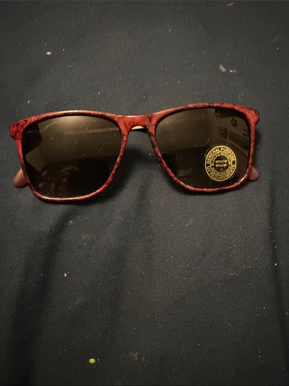 Red Marble Frame Sunglasses with Dark Lenses